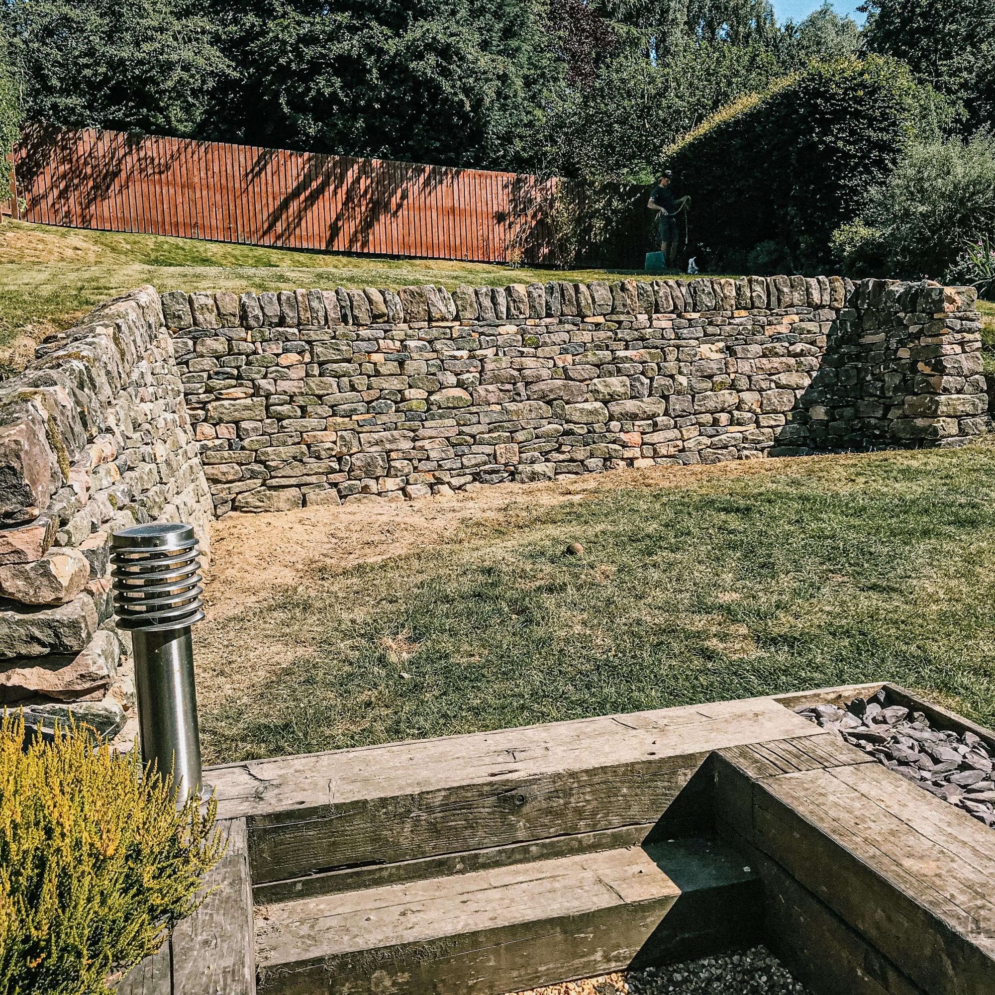 Dry stone walling - A  photo of a retaining dry stone wall with two corners built by Silver Oak in Fulwood, Sheffield